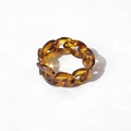 Close-up of amber resin chain link ring with a translucent tortoiseshell texture design - Dark Tortoiseshell