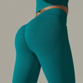 High-waisted seamless yoga leggings in peacock green with ribbed texture and scrunch butt - S / Bottoms / Dark Green
