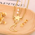 Gold layered necklace with star moon pendants and pearl earrings on a wooden tray - Golden Set (KS200544-KFC)