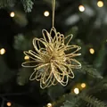Décoration de Noël ajourée à paillettes dorées en forme d'étoile fleurie, 10cm de diamètre - Boule de fleurs dorée