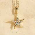 Ocean star necklace pendant in gold finish with vibrant multicolor zircon inlay stones - Colorful Starfish