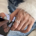 Elegant 925 sterling silver wavy open ring in silver finish worn by a fashion model - Silver Wave Plain (JZ0855)