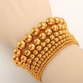 Elastic gold bead bracelets for women in stainless steel, featuring varied bead sizes - Gold Set
