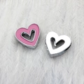 Pink enamel and silver hollow heart charms for 8mm wristbands on white feathers - Rose Red Hollow