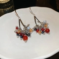Detail of vintage glass bead earrings with silver hooks on a white ceramic plate - Ear Hook-Silver-Gold-Red