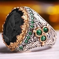 Macro shot of luxury vintage men's ring with emerald green accents and gold leaf details - US 7 / Black (TJZ22021)
