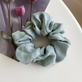 Light blue satin silk scrunchie with pleated texture shown on minimalist background - 12# Light Green