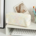 Detail of tweed pencil case with colorful woven dots on desktop with keyboard - Off White