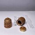 Macro shot of intricately carved green sandalwood sachet containers with threaded lid detail - Green Sandalwood Ruyi Shape / Approx 3*2.3cm