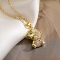 Detail of gold-plated bear pendant with pink zircon crystals on silk background - Pink Bear Style(23649)