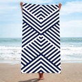 Navy blue and white geometric striped microfiber beach towel on a sunny sandy beach - B18-Navy Blue and White Geometric Stripes