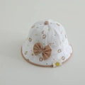Dettaglio del cappello da sole per neonati con stampe di ciambelle e fiocco marrone - 50cm 1-3 Anni / Cachi