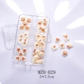 Detail of DIY nail art charms with bear, paw, and bow shapes in a transparent organizer box - Cartoon Bear Style (H29)