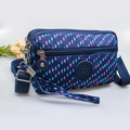 Navy blue crossbody phone bag with multi-layer zippers and pink geometric patterns - Blue with Colorful Dots