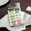 Set of 6 mini crown hair clips in pastel matte colors on a jewelry display card - Set 7