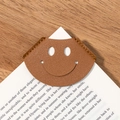 Brown faux leather corner bookmark with smiley face design and hand-stitched edges - Brown