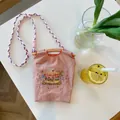 Pink mini nylon crossbody bag with carousel embroidery and colorful woven strap - Pink Mini