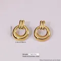 Minimalist golden stainless steel hoop earrings with polished finish on a lilac background - Glossy Ring Drop (FYD6150)