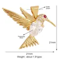 Gold hummingbird pendant with clear teardrop zircon and red eye stone detail - M778040-Clear Gold Hummingbird