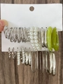 Silver earring set with pearls and green resin hoops on display card over wood surface - Silver White Set (1517+1054)