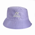 Close-up of N GRACE white embroidery on a lavender cotton reversible bucket hat - 55-58cm / Lavender (Grace)