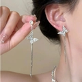 Elegant silver bow tassel earrings with sparkling crystals for a minimalist luxury look - Silver Butterfly Rhinestone Tassel