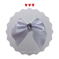 White silk ribbon bow hair accessory featuring a square rhinestone center on a paper card - White