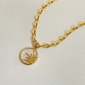 Detail of vintage 18k gold plated sun coin pendant with white mother of pearl enamel inlay - Sun 45 + 5cm