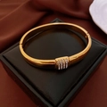 Detail of gold teardrop bangle featuring a pave square clasp set with sparkling crystals - Gold Square Buckle Inlaid Crystal Hard Style (43#)