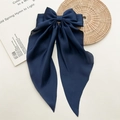 Elegant navy blue satin bow hair clip with long streamers on a minimalist background - Navy Blue