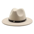 Close-up of beige fedora hat featuring a brown leather band with metallic star studs - Beige