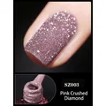 Dettaglio macro dello smalto glitter rosa SZ003 con texture scintillante e applicatore - 8ml / Rosa SZ03
