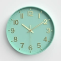 Modern mint green 12-inch wall clock with golden 3D numbers and silent quartz movement - Ice Blue
