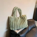 Detail of light green plush tote bag with vertical stripes and fuzzy ball handle texture - Matcha Green
