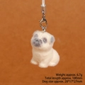 Cute beige pug plush keychain with metal hook and dimensions info on orange background - Pug