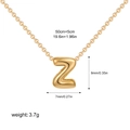 Technical diagram of golden bubble letter Z necklace with dimensions and chain length - Letter Z