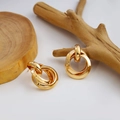Minimalist triple-loop gold geometric earrings with a polished vintage metallic finish - Minimalist Nested Hoops