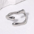 Irregular liquid style open ring in silver stainless steel on minimalist stone surface - Adjustable / Steel