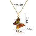 Golden butterfly pendant necklace with orange shell inlay and sparkling stone details - Amber Butterfly with Gold Glitter Necklace