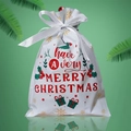 White Christmas drawstring gift bag with red festive lettering on green background - 16*24cm English Art Font