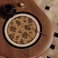Retro brown round leather placemat with black floral pattern on a dark wood table - French Medieval Style-Type P [Round]