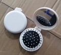 White foldable round hairbrush with built-in mirror and compact portable travel design - White