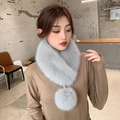 Faux fur grey scarf with large fluffy pompom detail for winter fashion warmth - Gray