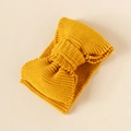 Ginger yellow knitted baby headband with a large double-layer bow on a neutral background - Ginger Yellow
