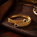Detail showing gold bracelet with green pear-cut gemstones and micro-pave zircons - 10425-Green Pear Bangle