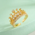 Elegant 18K gold plated crown ring with zircon crystals on a green background - Adjustable Open / Hollow Marquise Crown Style (13308)