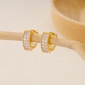 Gold-plated copper hoop earrings with double row cubic zirconia and heart cutouts - EH411003