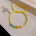 Bracciale intrecciato a mano con perle colorate traslucide e cordino giallo regolabile - Rosso Perle Tonde (69#)