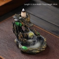 Resin backflow incense burner featuring a dragon and mountain design in deep brown and gold - Dragon