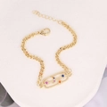 Detail of gold chain bracelet with colorful gemstones and star and moon charm motifs - Colored Zircon Star Moon Frame (12#)